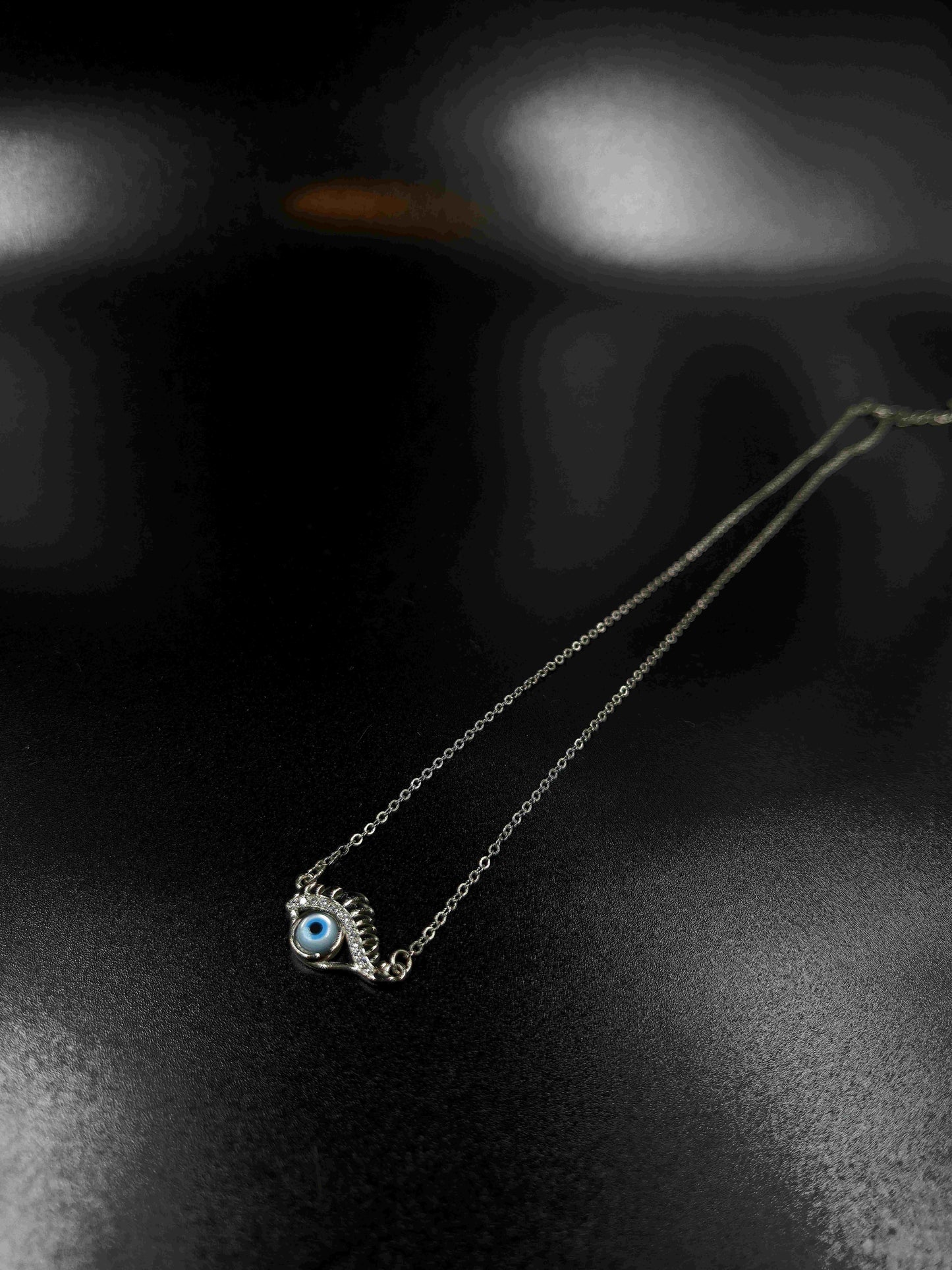 Artisan crafted Evil eye silver necklace