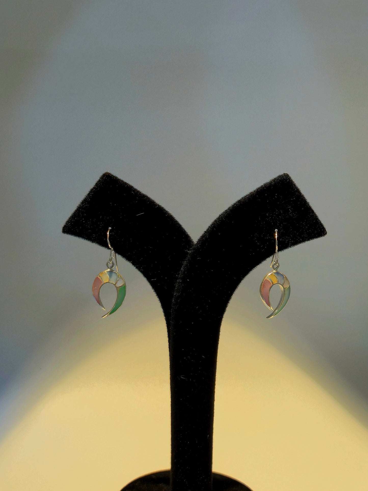 Silver dangle with multi colour stones.